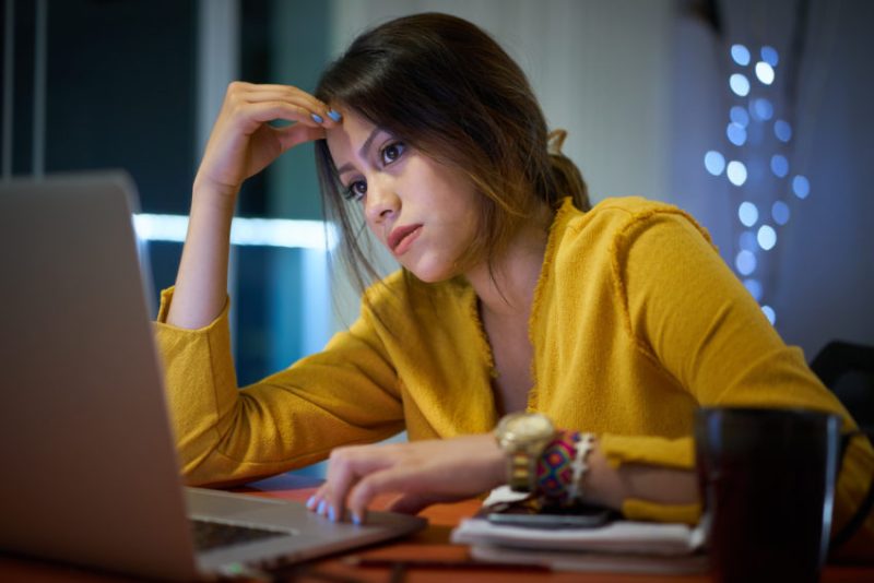 Pensive Girl College Student Studying At Night